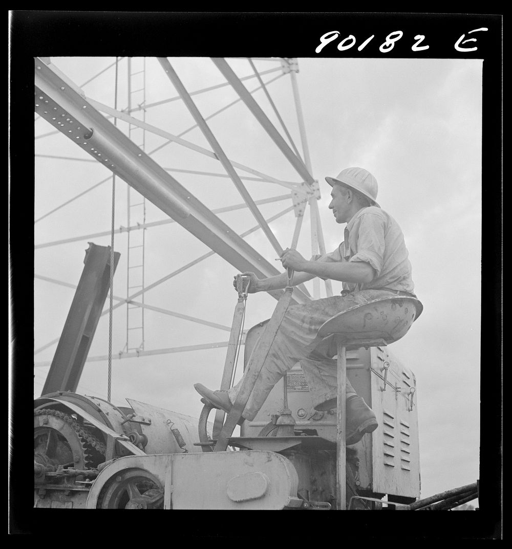 Servicing an old oil well near Wichita, Kansas. Sourced from the Library of Congress.