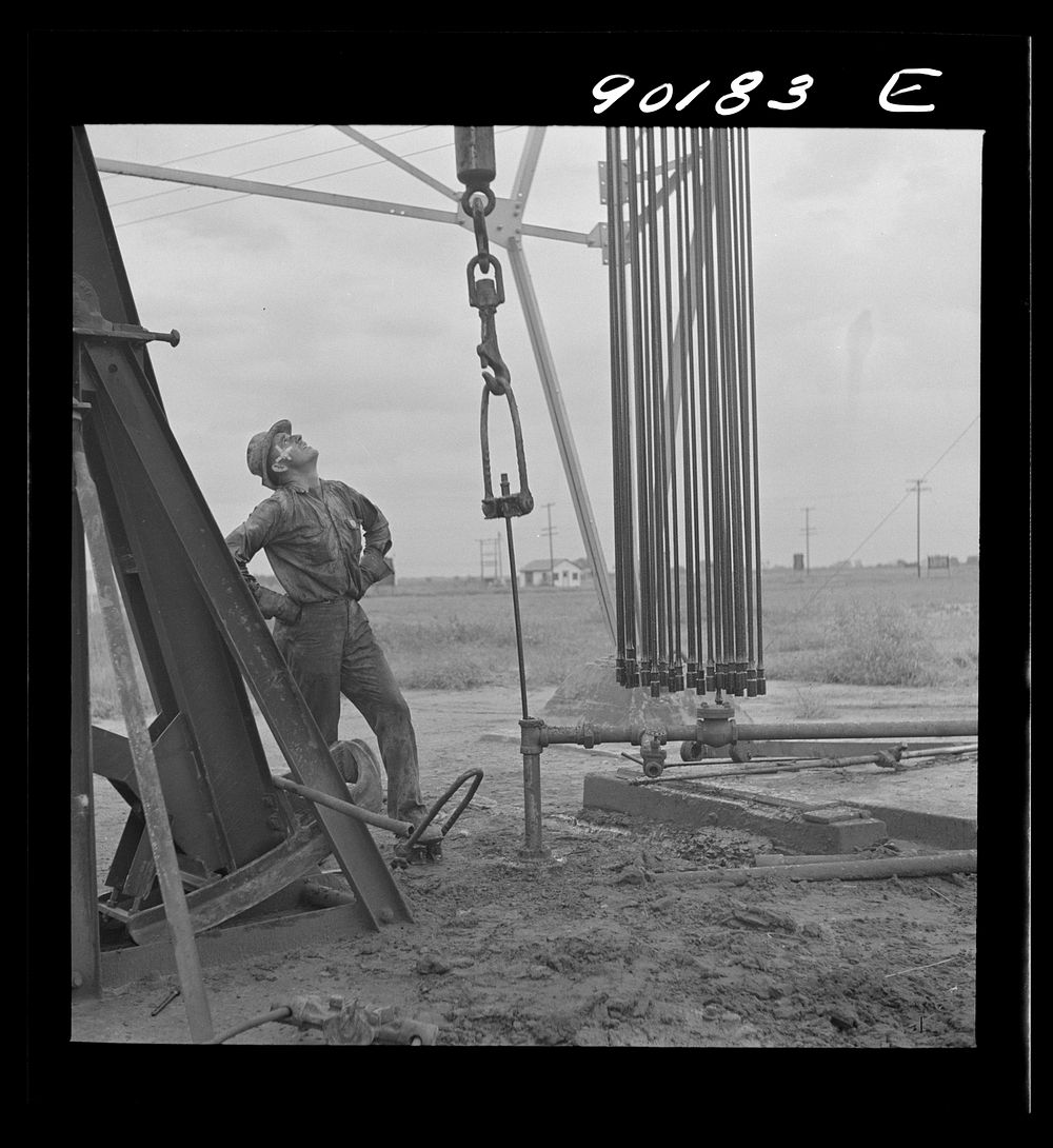 Wichita (vicinity), Kansas. Servicing an old oil well. Sourced from the Library of Congress.