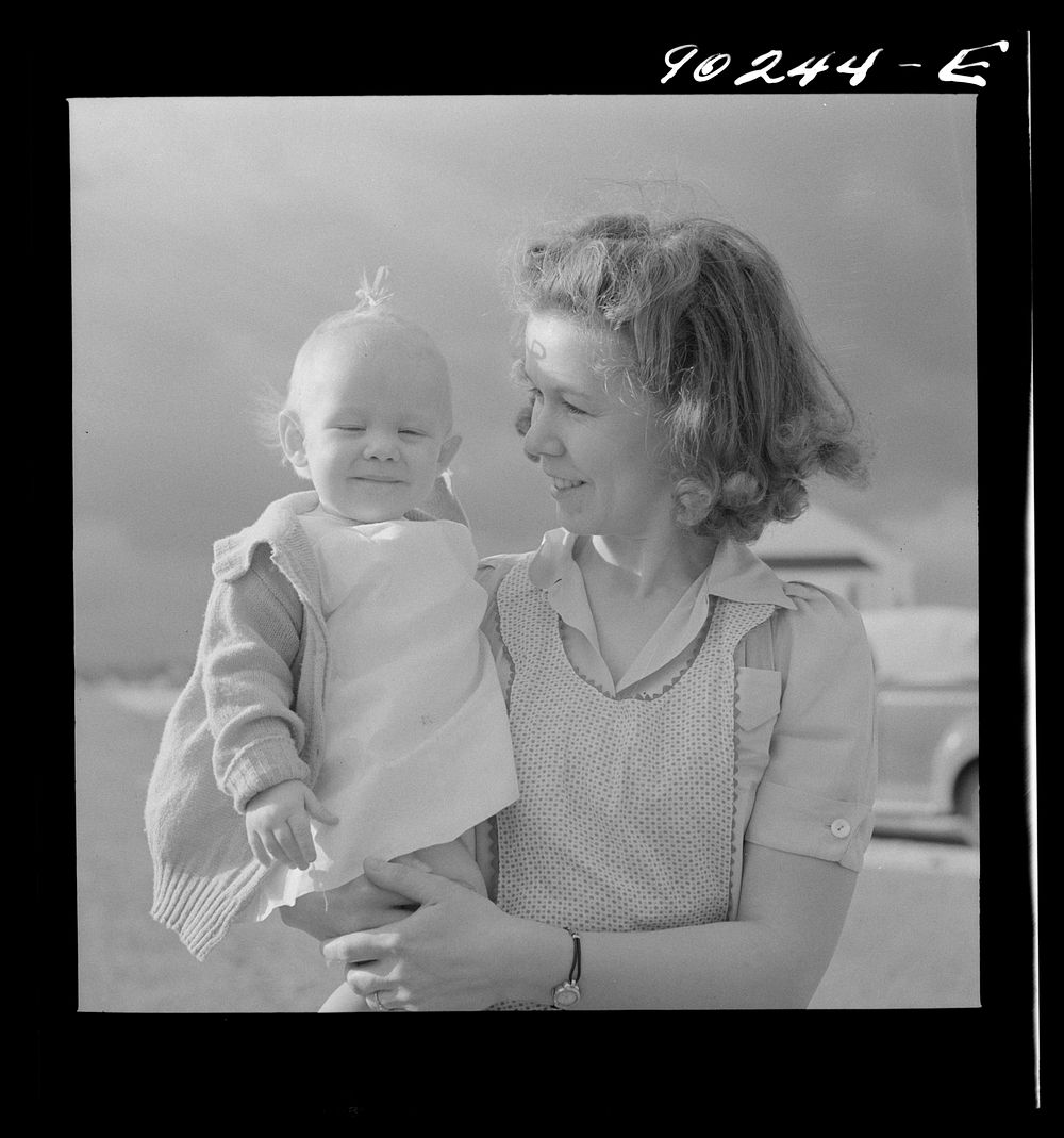 Mrs. B.M. Henderson, wife of defense worker, and daughter, who live in Sunset Village. FSA (Farm Security Administration)…
