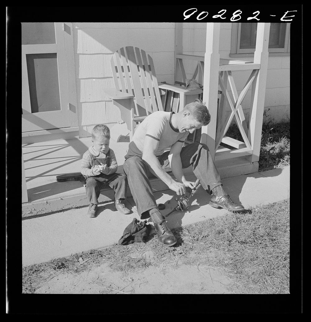 Radford, Virginia. Sunset Village, FSA housing project. Fred B. Williams from Savannah, Georgia, and his son "Buddy"…