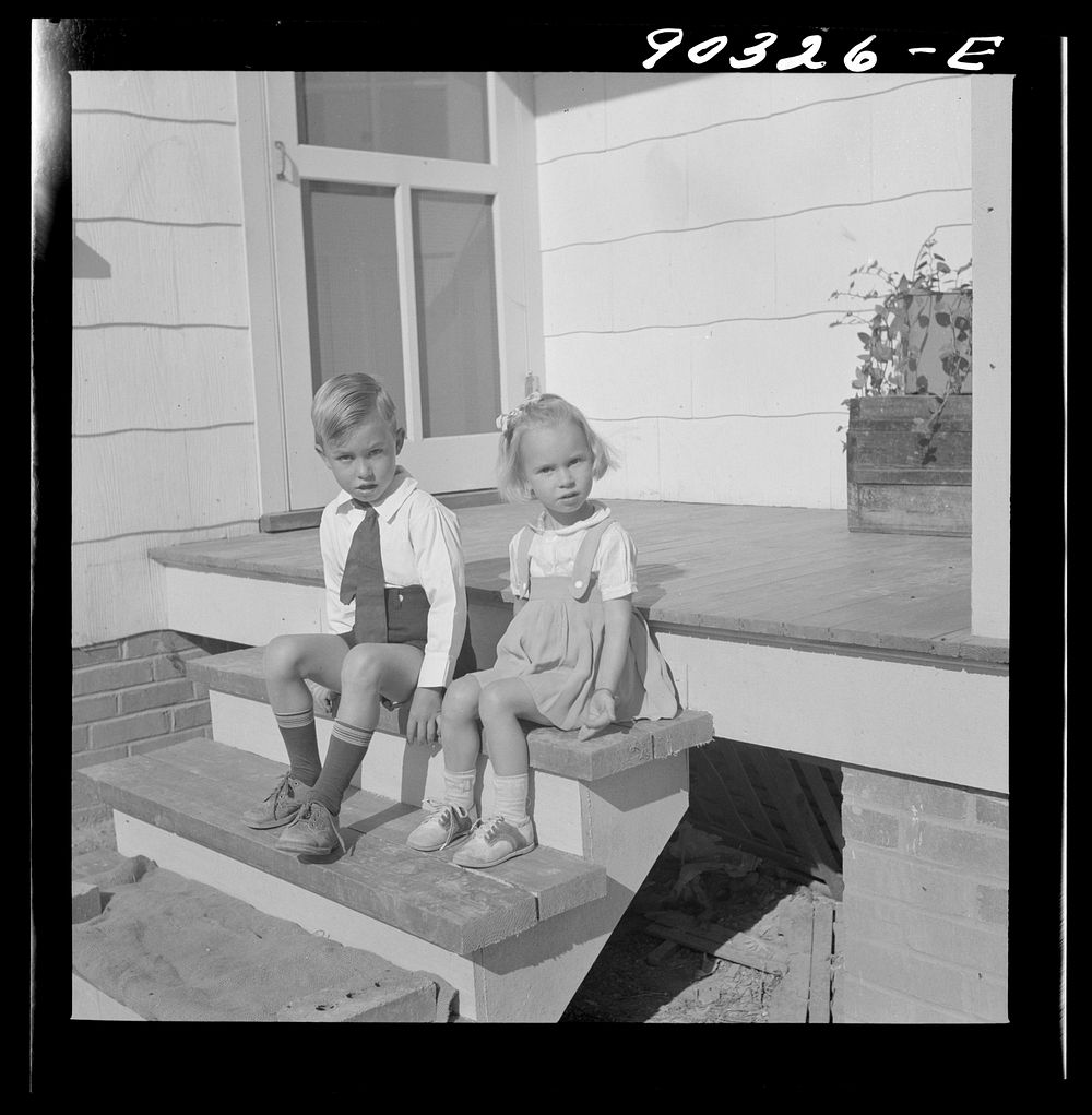 Elsie, Marie, and Howard Jr., children of Mr. Howard H. Smith from Galax, Virginia who live in new rural home built by FSA…