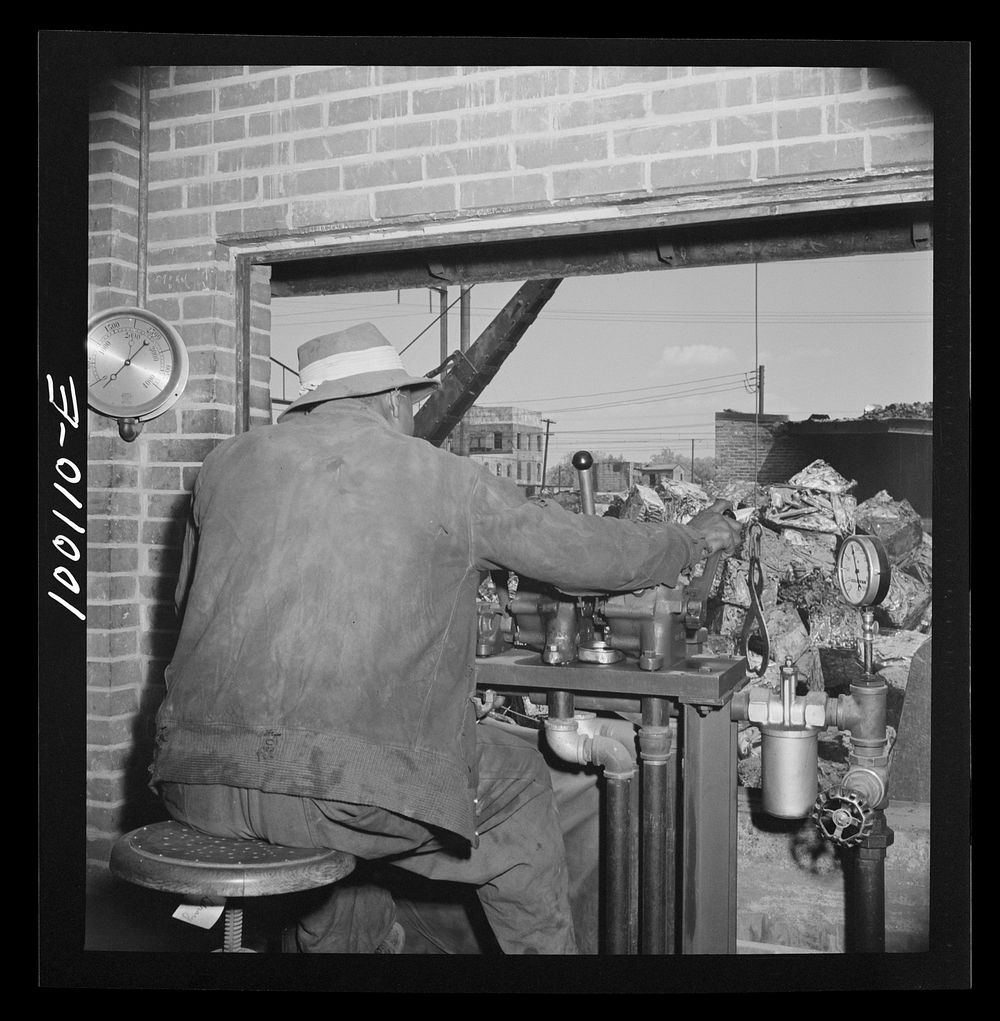 Washington, D.C. Scrap salvage campaign, Victory Program. Motor which runs hydraulic press for metal in a wholesale…
