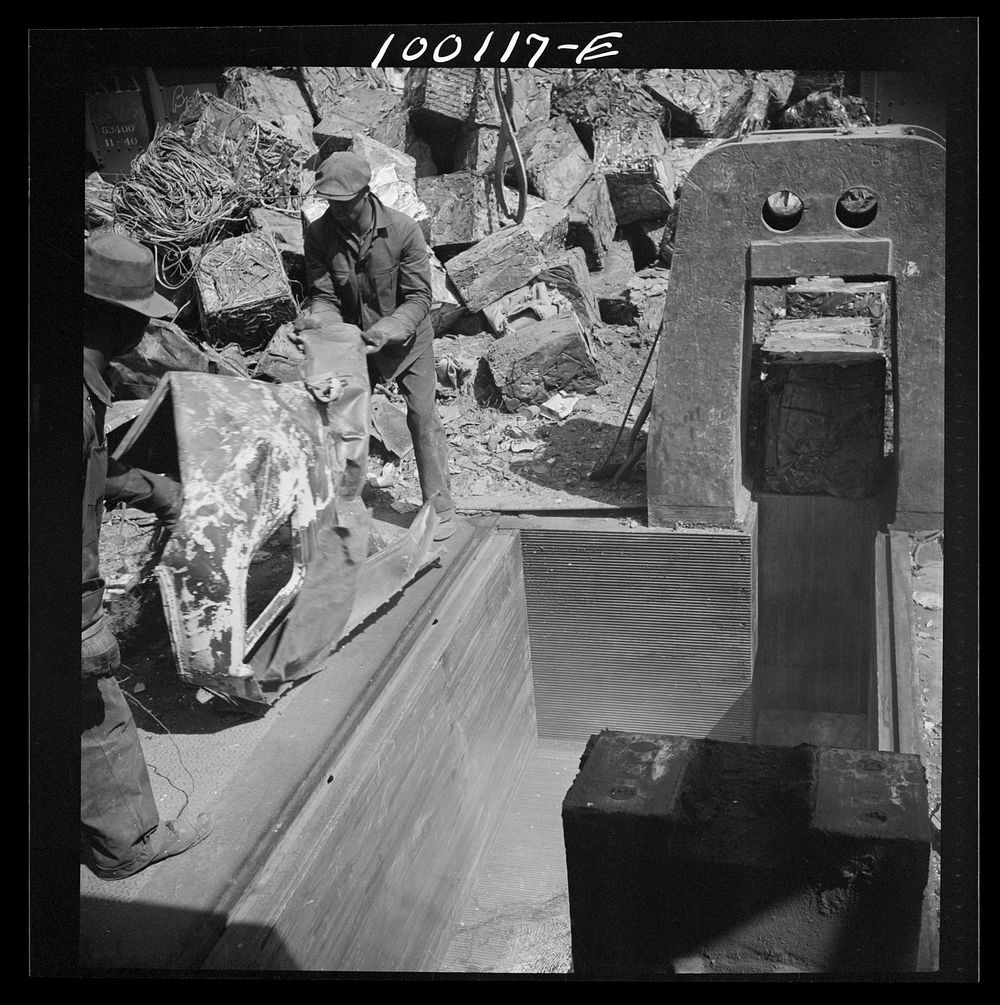 [Untitled photo, possibly related to: Washington, D.C. Scrap salvage campaign, Victory Program. Powerful hydraulic press for…