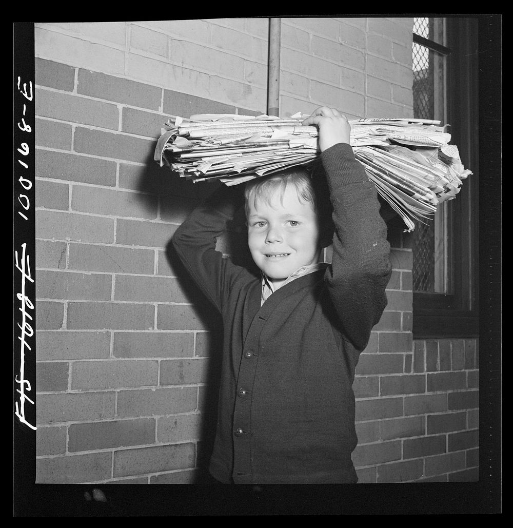 Washington, D.C. Scrap salvage campaign, Victory Program. Washington schoolchild brings a load of scrap paper to school once…