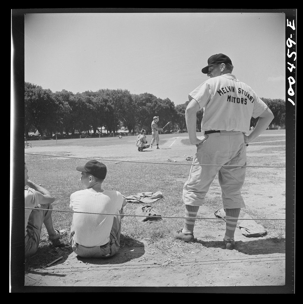 Washington, D.C. Players in an amateur baseball game between the employees' recreation association and a team recruited from…