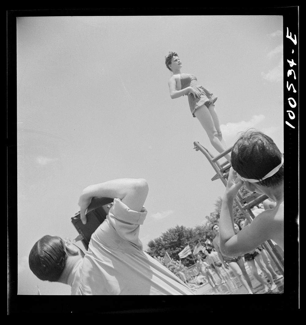 [Untitled photo, possibly related to: Washington, D.C. Publicity photographer and model at the municipal swimming pool on…