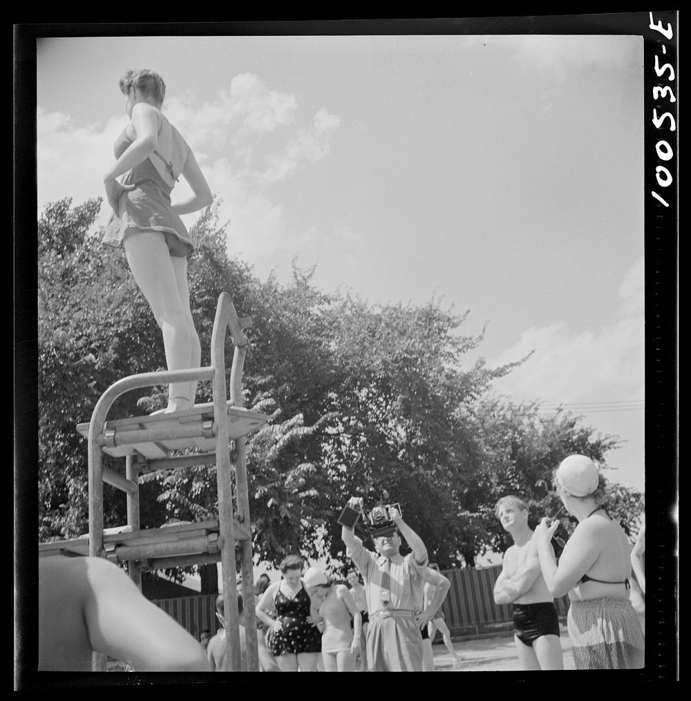 Washington, D.C. Publicity photographer and model at the municipal swimming pool on Sunday. Sourced from the Library of…