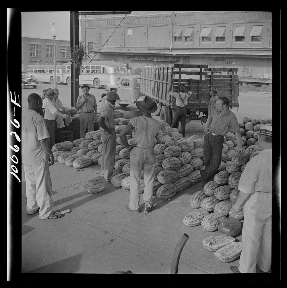 Washington, D.C. Unloading watermelons at the farmers' market. Sourced from the Library of Congress.