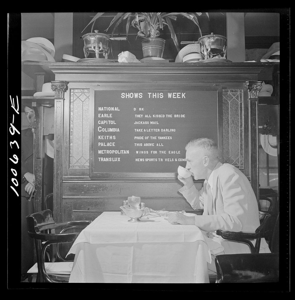 Washington, D.C. Occidental Hotel restaurant on Pennsylvania Avenue at noon. The board lists shows in town. Sourced from the…