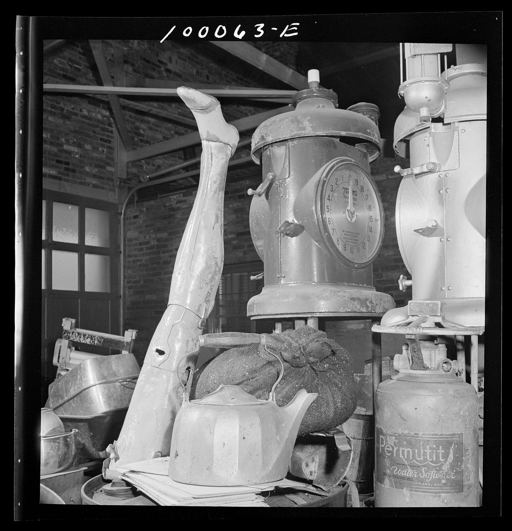 Washington, D.C. Salvage drive, Victory Program. Artificial leg, kettle and gas tank among objects stored in warehouse of…