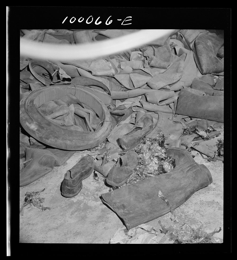 Washington, D.C. Salvage drive, Victory Program. Rubber scrap stored in warehouse of District wholesale junk company.…