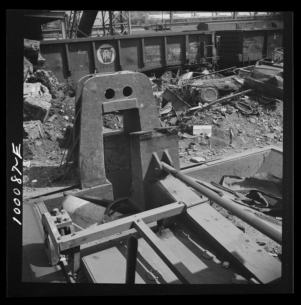 Washington, D.C. Scrap salvage campaign, Victory Program. Powerful hydraulic press for pressing metal scrap into blocks in…