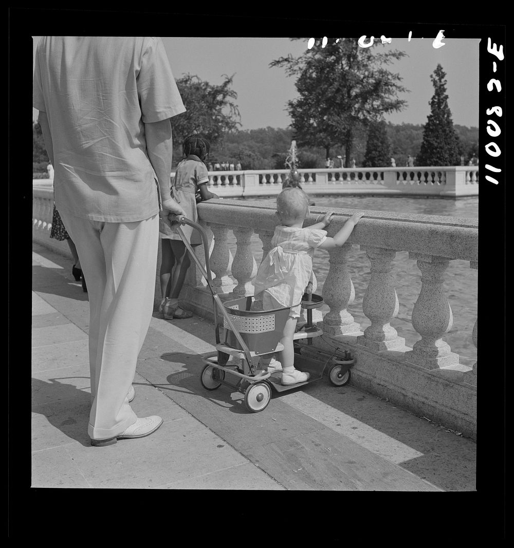 Detroit, Michigan. Child in toddler go-cart. Sourced from the Library of Congress.