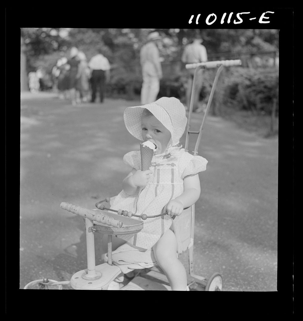 [Untitled photo, possibly related to: Detroit, Michigan. Little girl with ice cream cone in the zoological park]. Sourced…