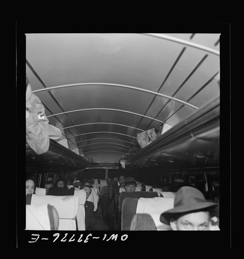 Bus passengers on their way from Cincinnati, Ohio to Louisville, Kentucky on a Greyhound bus. Sourced from the Library of…