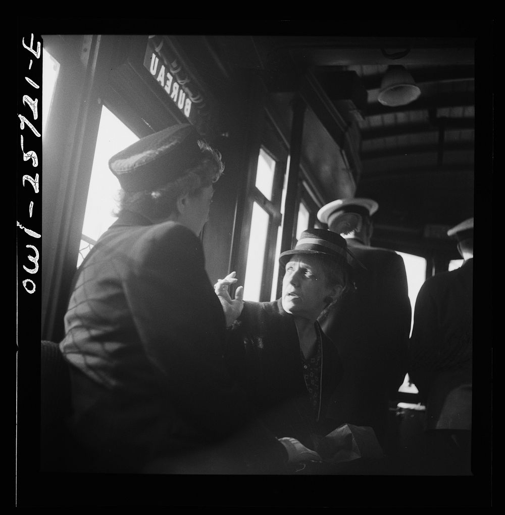 Arlington, Virginia. Women engaged in conversation on a street car. Sourced from the Library of Congress.