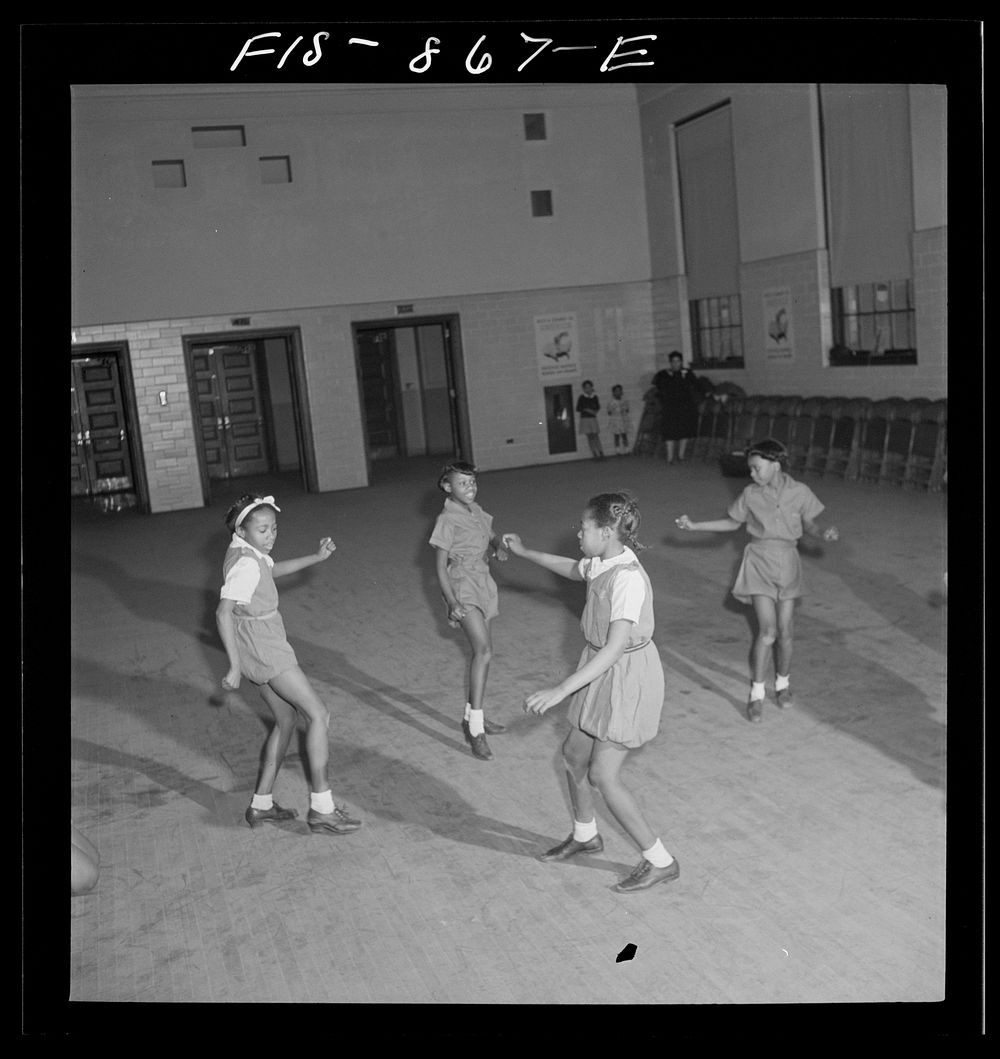 [Untitled photo, possibly related to: Washington, D.C. Dancing class at an elementary school]. Sourced from the Library of…