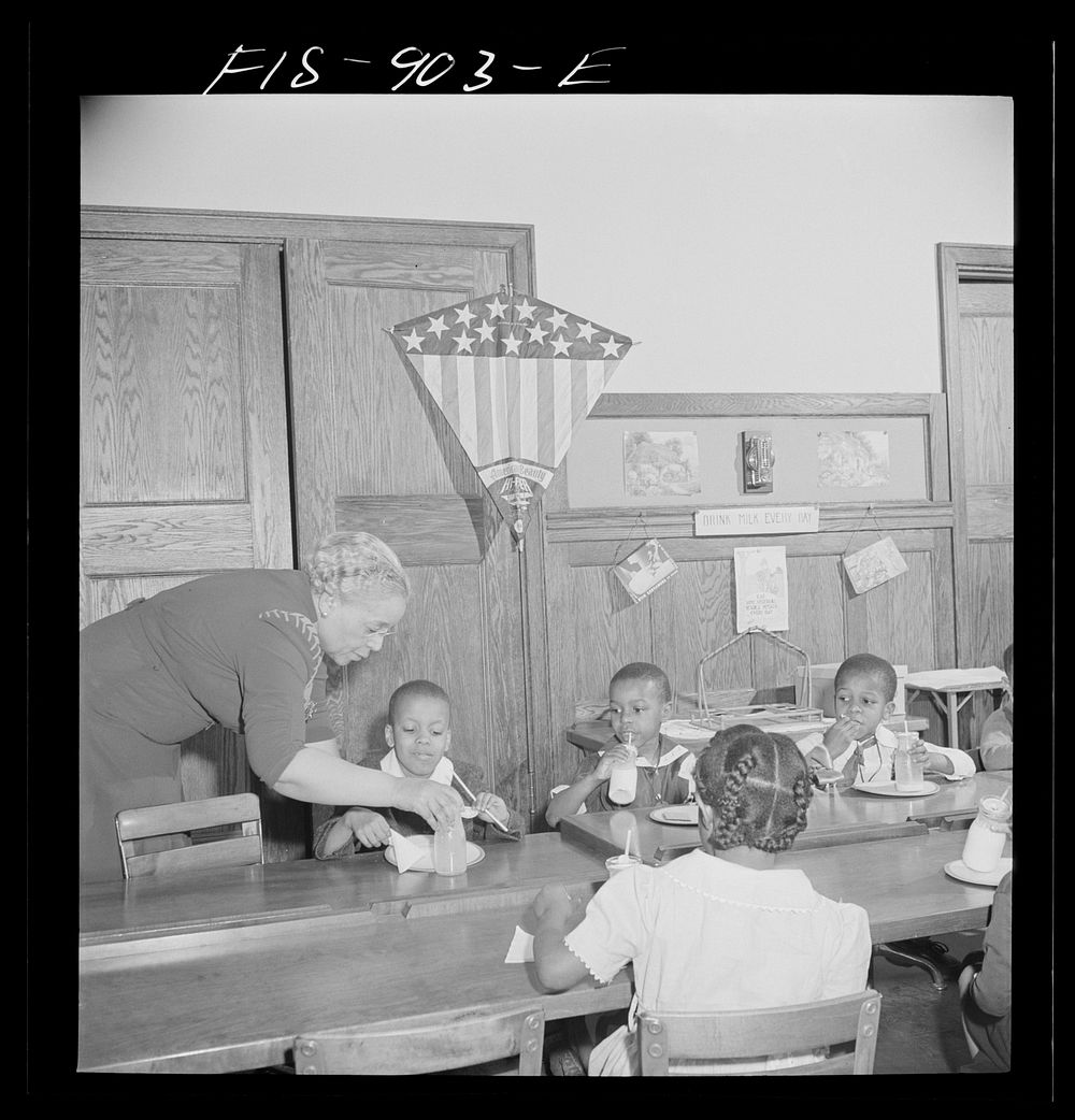 Washington, D.C. Free morning lunch in the kindergarten of a  school. Sourced from the Library of Congress.