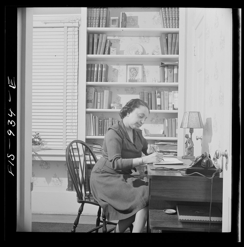 Washington, D.C. Teacher in her study at home. Sourced from the Library of Congress.