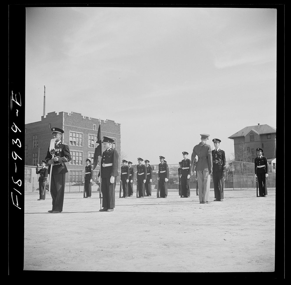 [Unititled photo, possibly related to: Washington, D.C. Military unit in Armstrong Technical High School being trained by a…