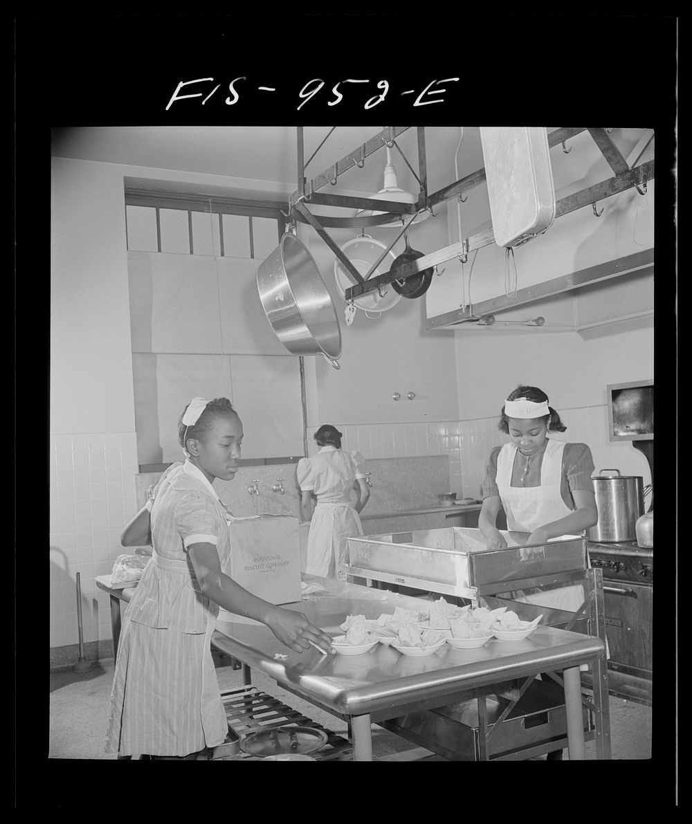 Washington, D.C. Students help prepare lunch for the school cafeteria at the Armstrong Technical High School. Sourced from…