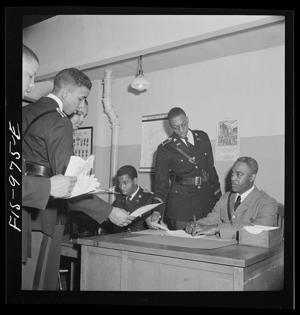 [Untitled photo, possibly related to: Washington, D.C. Members of the military unit at the Armstrong Technical High School…