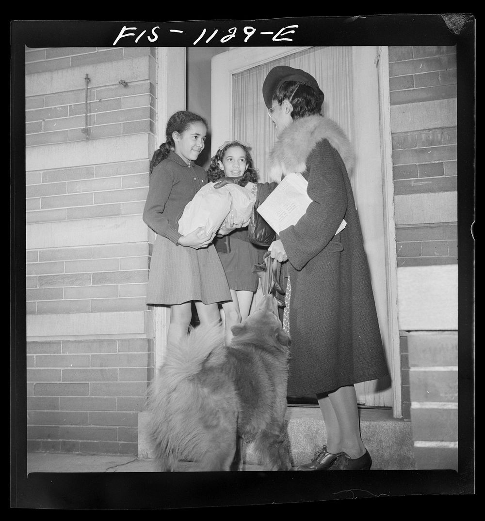 Washington, D.C. Jewal Mazique [i.e. Jewel], worker at the Library of Congress, coming home from work. Sourced from the…
