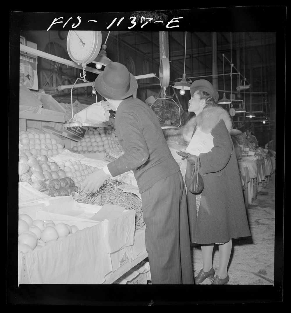 [Untitled photo, possibly related to: Washington, D.C. Jewal Mazique [i.e. Jewel] doing her shopping enroute home from her…