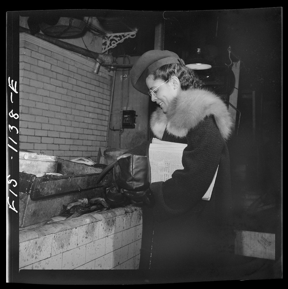 [Untitled photo, possibly related to: Washington, D.C. Jewal Mazique [i.e. Jewel] doing her shopping enroute home from her…