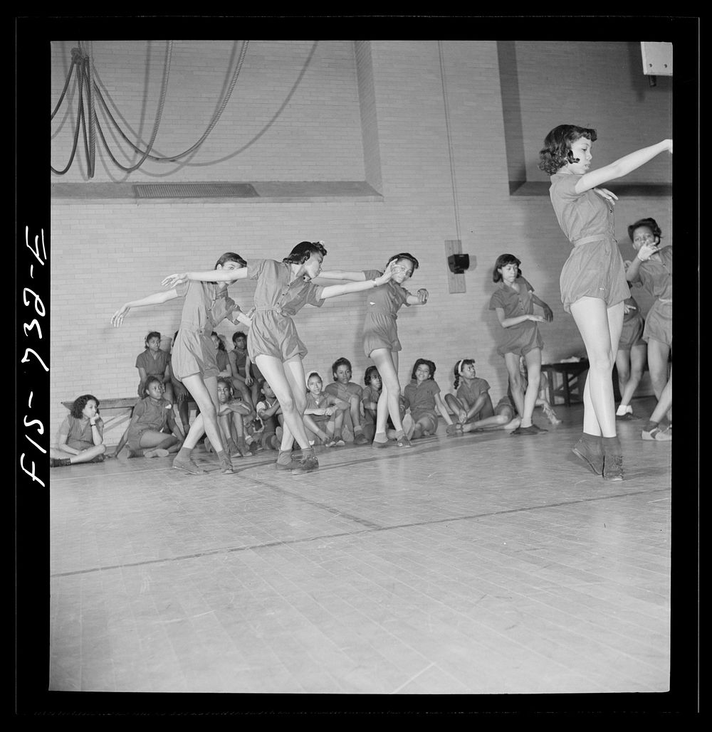 [Untitled photo, possibly related to: Washington, D.C. Dancing class at an elementary school]. Sourced from the Library of…