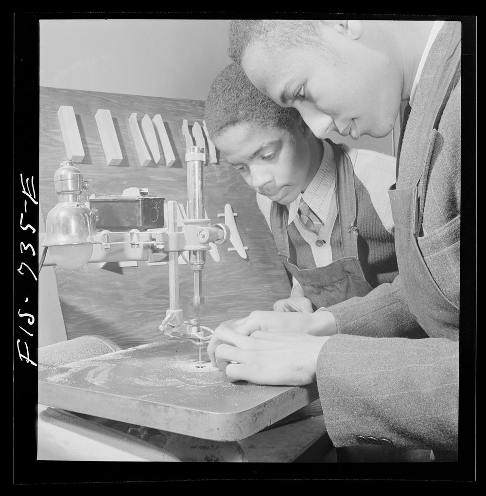 Washington, D.C. Learning to use an electrical jigsaw to make model airplanes for the U.S. Navy at the Armstrong Technical…
