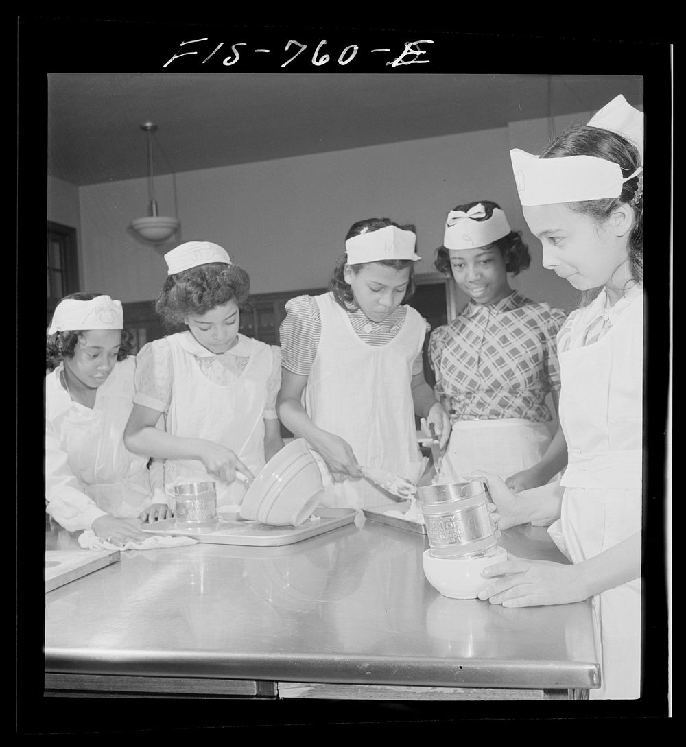 [Untitled photo, possibly related to: Washington, D.C. Cooking class at the Banneker Junior High School]. Sourced from the…