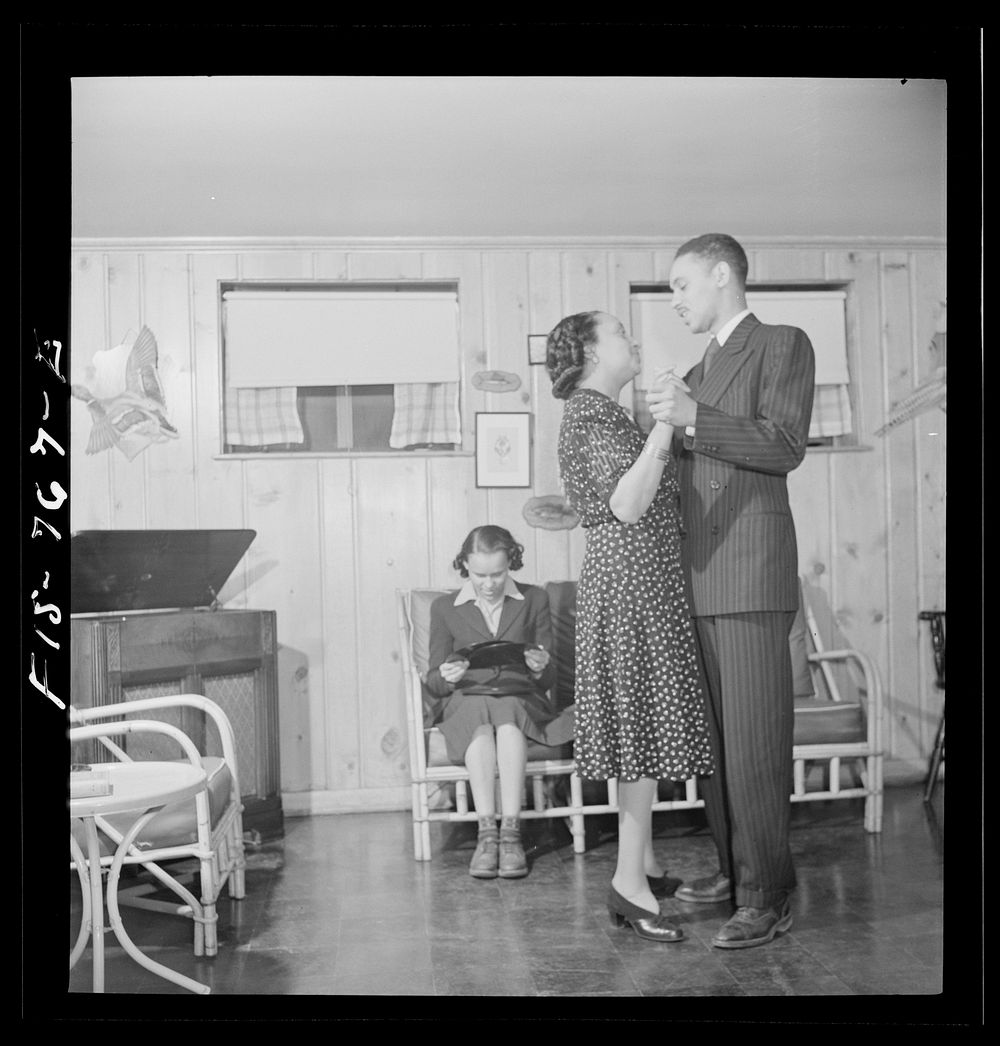 [Untitled photo, possibly related to: Washington, D.C.  school teacher whose husband is a doctor watching her son and…