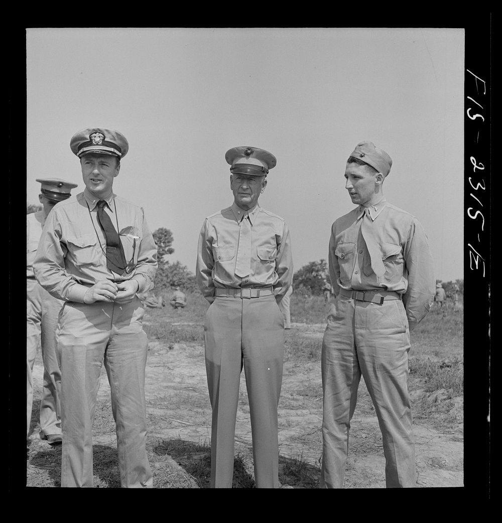 Parris Island, South Carolina. Brigadier General Emile Moses talking with a Marine Corps lieutenant and a Navy lieutenant at…