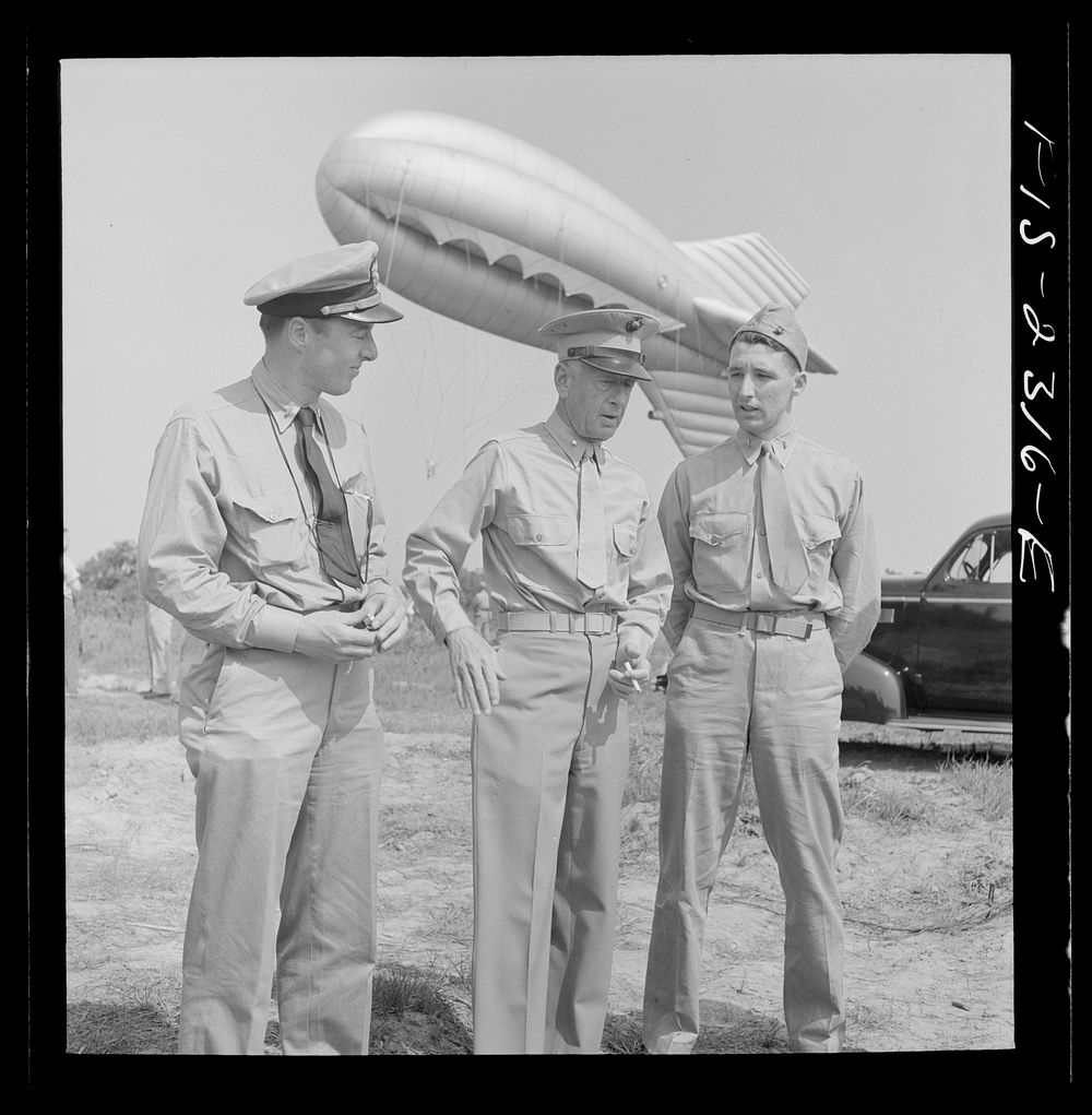 Parris Island, South Carolina. Brigadier General Emile Moses talking over barrage balloon tactics with a Marine Corps…