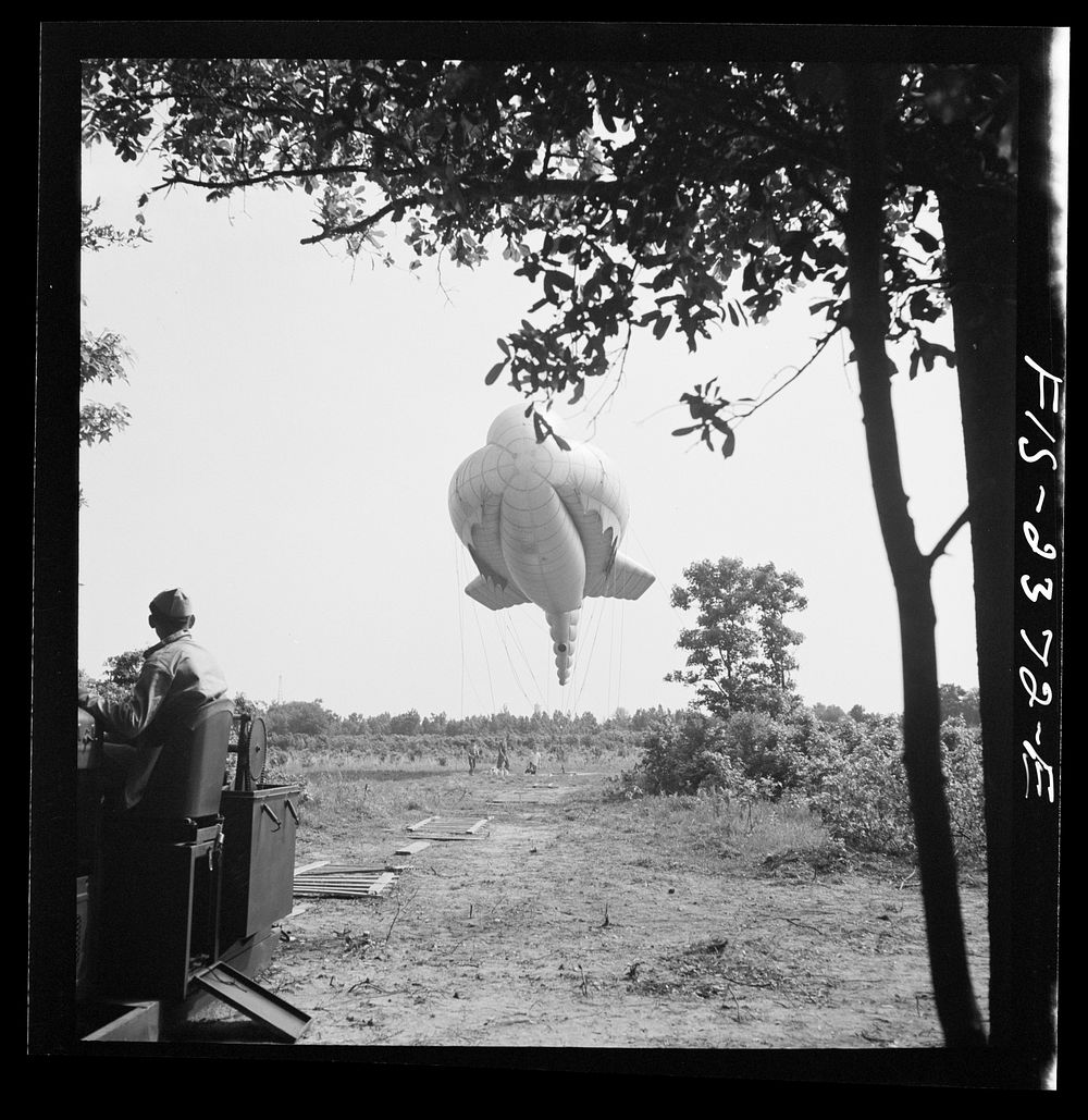 [Untitled photo, possibly related to: Parris Island, South Carolina. Tactical formations of barrage balloons prevent dive…