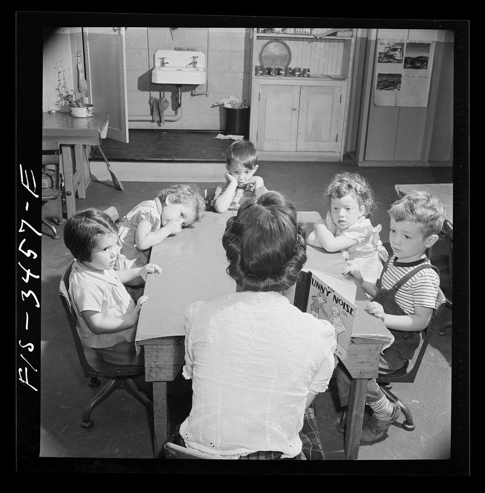 Greenbelt, Maryland. Federal housing project. Story hour in the nursey school which is run cooperatively by the mothers. The…