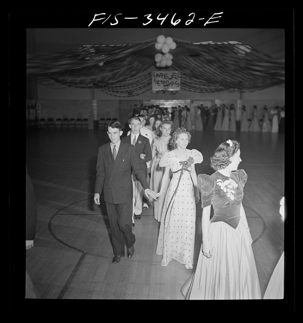 Greenbelt, Maryland. Federal housing project. Grand march at the senior prom which was held in the gymnasium of the…