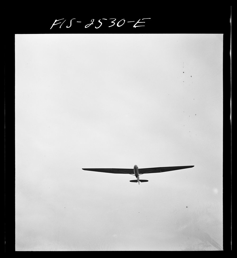 Parris Island, South Carolina. U.S. Marine Corps glider detachment training camp. Glider plane in flight. Sourced from the…