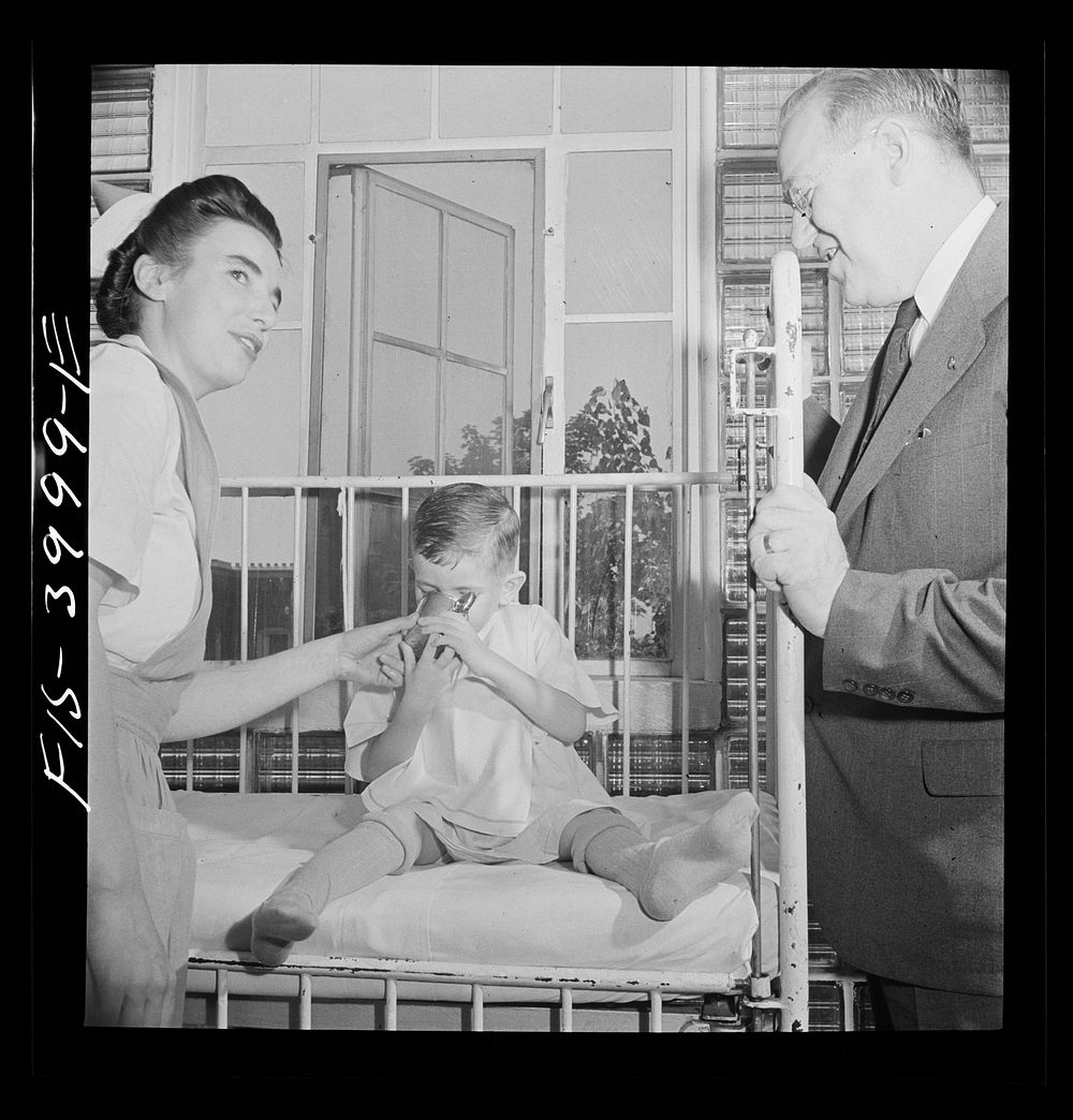 [Untitled photo, possibly related to: Washington, D.C. Mr. Lund, who is head of the District Red Cross, visits the…