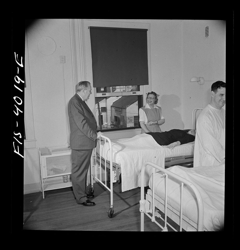 [Untitled photo, possibly related to: Washington, D.C. Mr. Lund, who is the head of the District Red Cross, watching a…