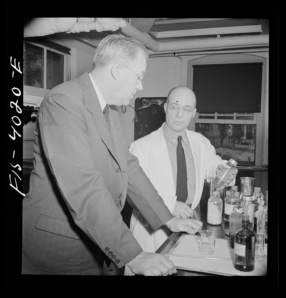 [Untitled photo, possibly related to: Washington, D.C. Mr. Lund, who is head of the District Red Cross, watching the testing…