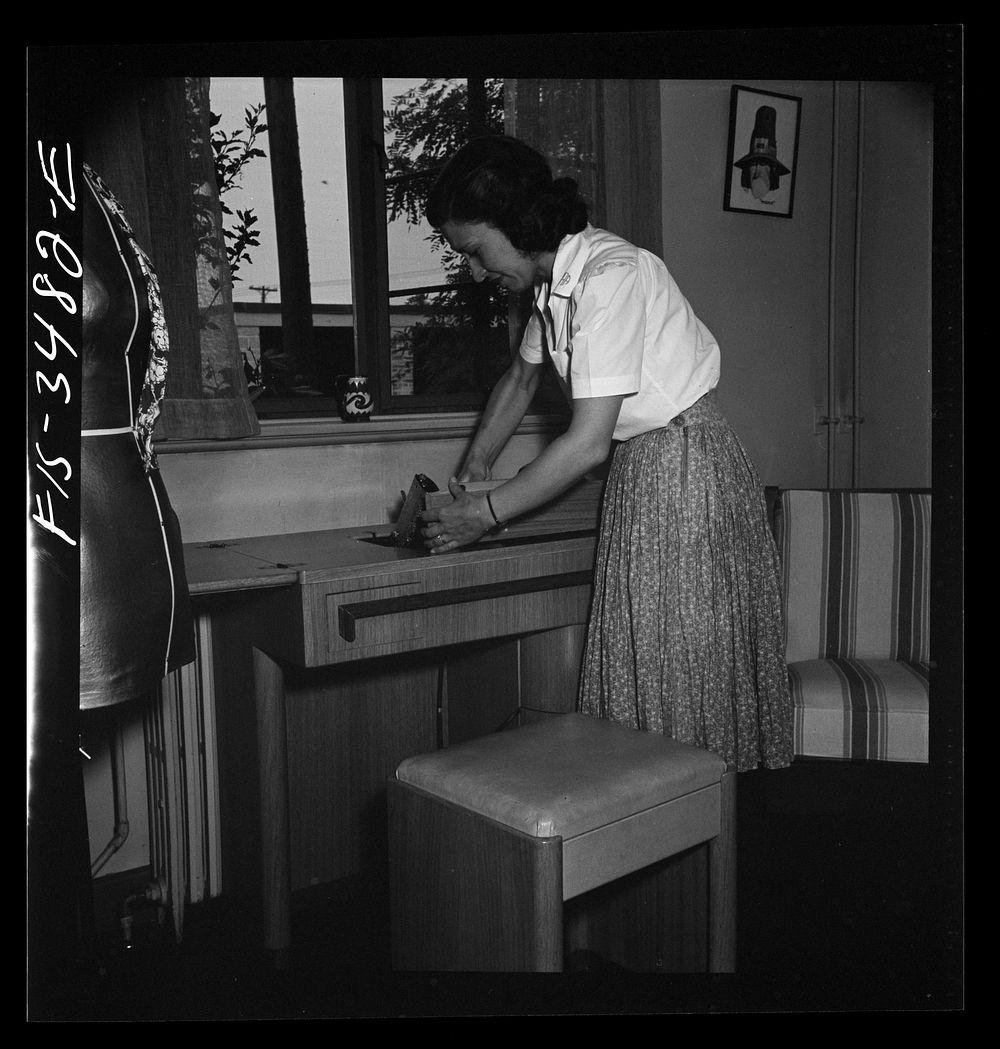 [Untitled photo, possibly related to: Greenbelt, Maryland. Federal housing project. Mrs. Leslie Atkins keeps scraps and…