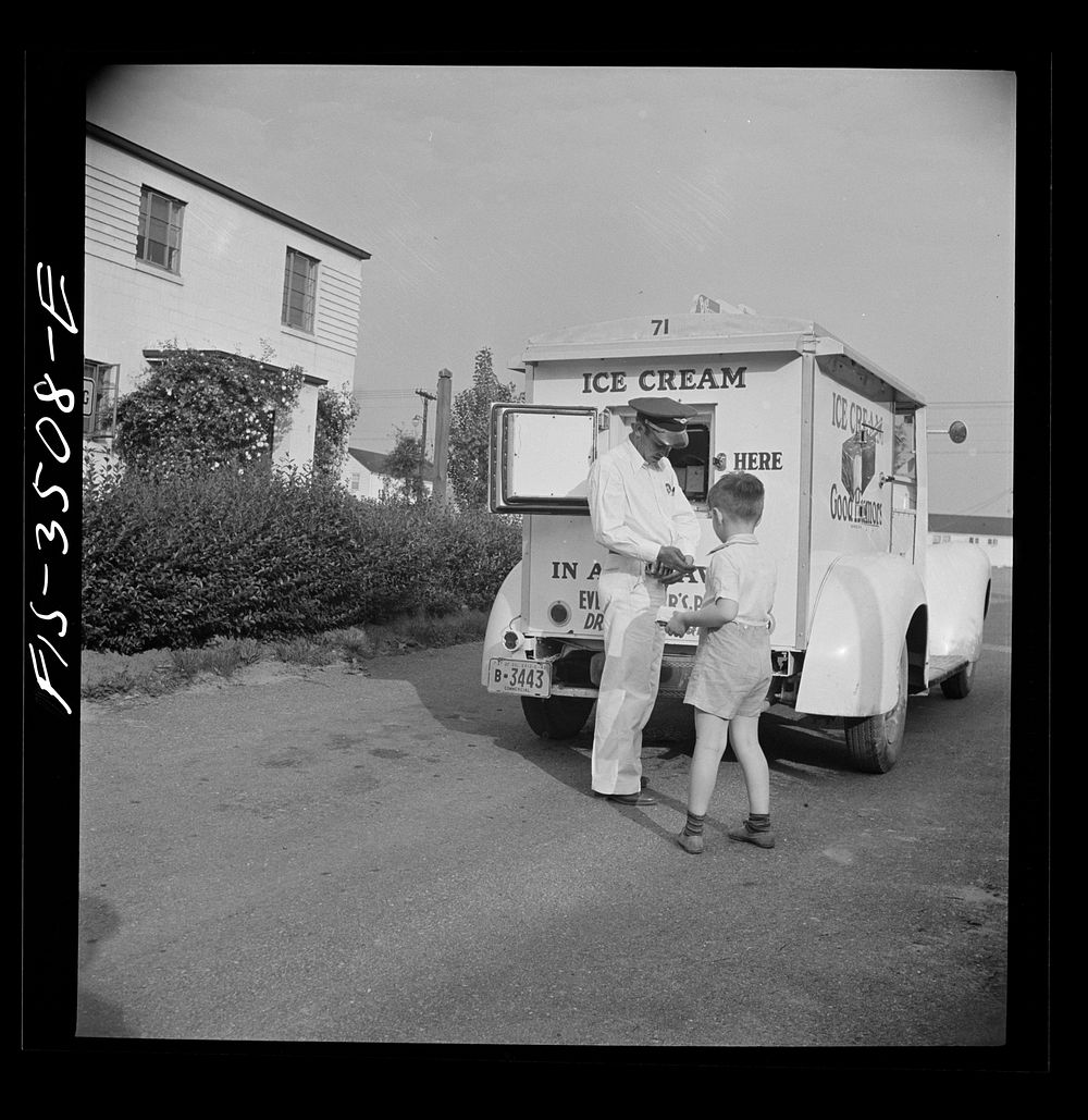 Greenbelt, Maryland. Federal housing project. The Good Humor man is a daily visitor in summer. Sourced from the Library of…