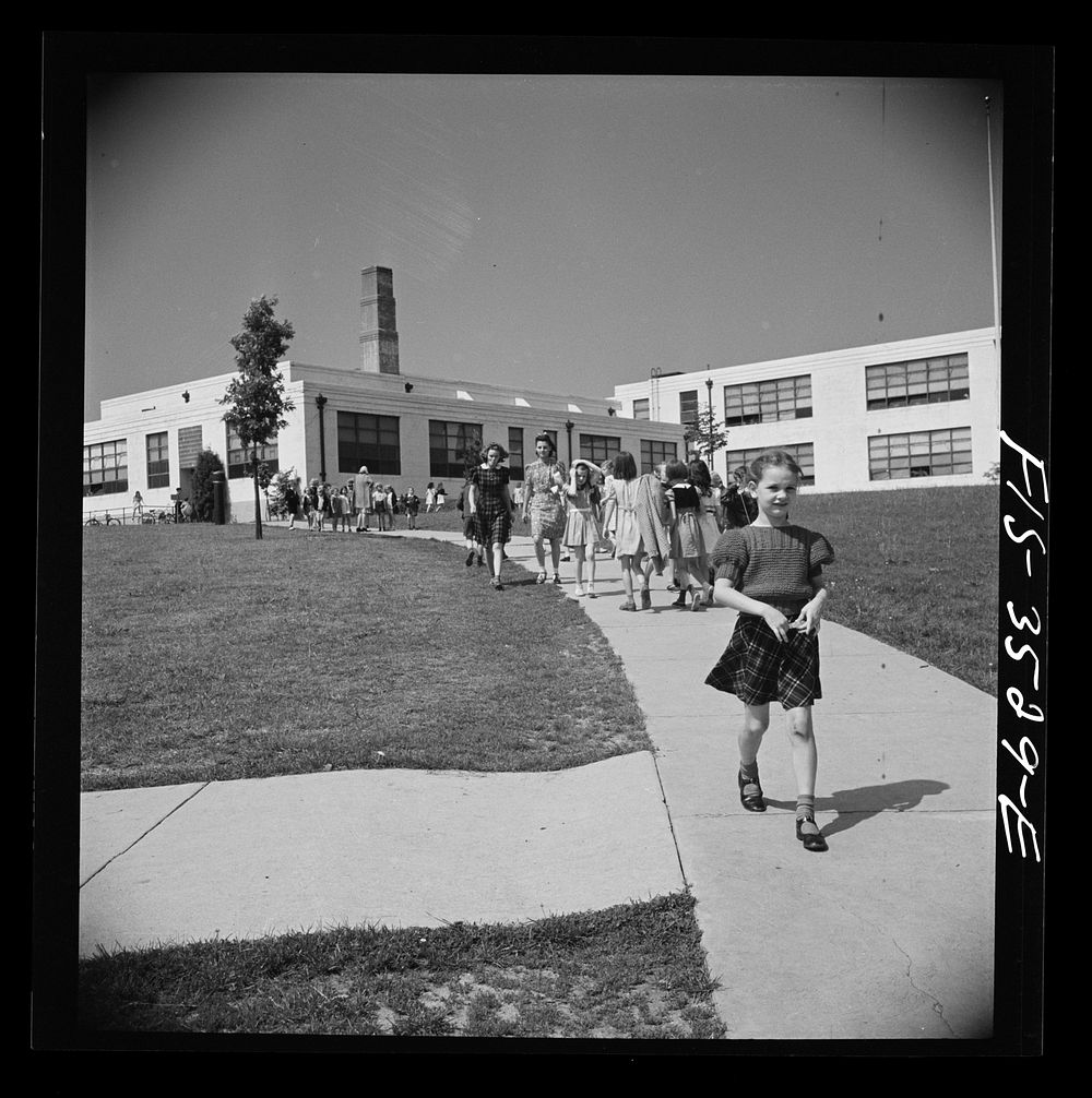 Greenbelt, Maryland. Federal housing project. Children going home from school. Sourced from the Library of Congress.