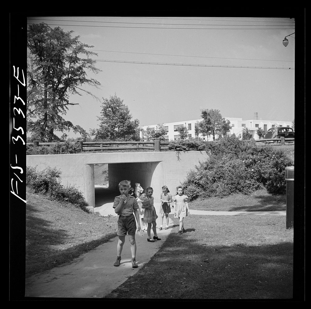 Greenbelt, Maryland. Federal housing project. Most street crossings are eliminated by underpasses so that children can…
