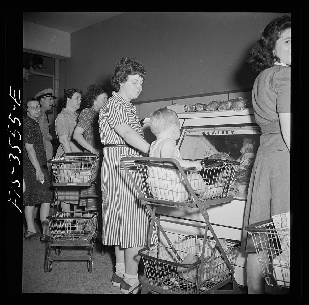 [Untitled photo, possibly related to: Greenbelt, Maryland. Federal housing project. Shopping in the cooperative grocery…