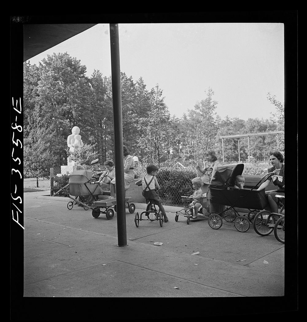 Greenbelt, Maryland. Federal housing project. Typical scene outside the grocery store. Sourced from the Library of Congress.