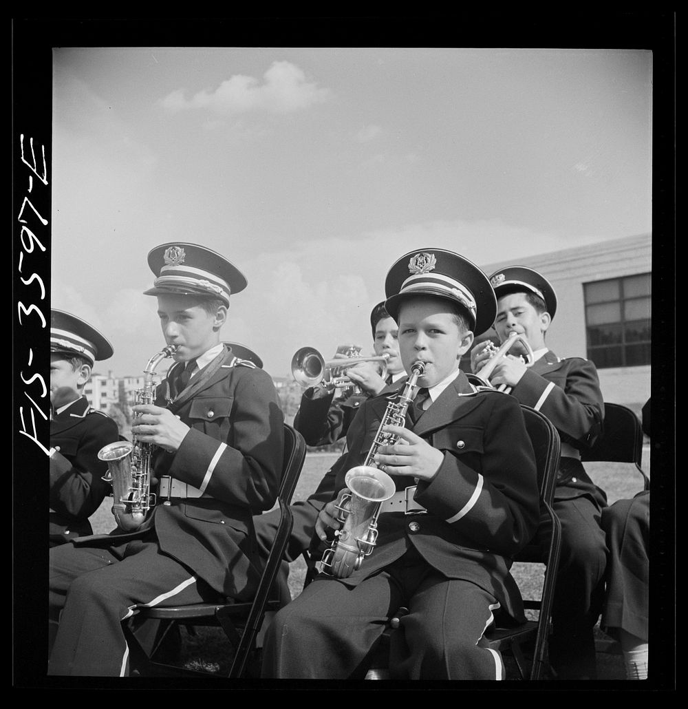[Untitled photo, possibly related to: Greenbelt, Maryland. High school band in green uniforms giving a band concert on…