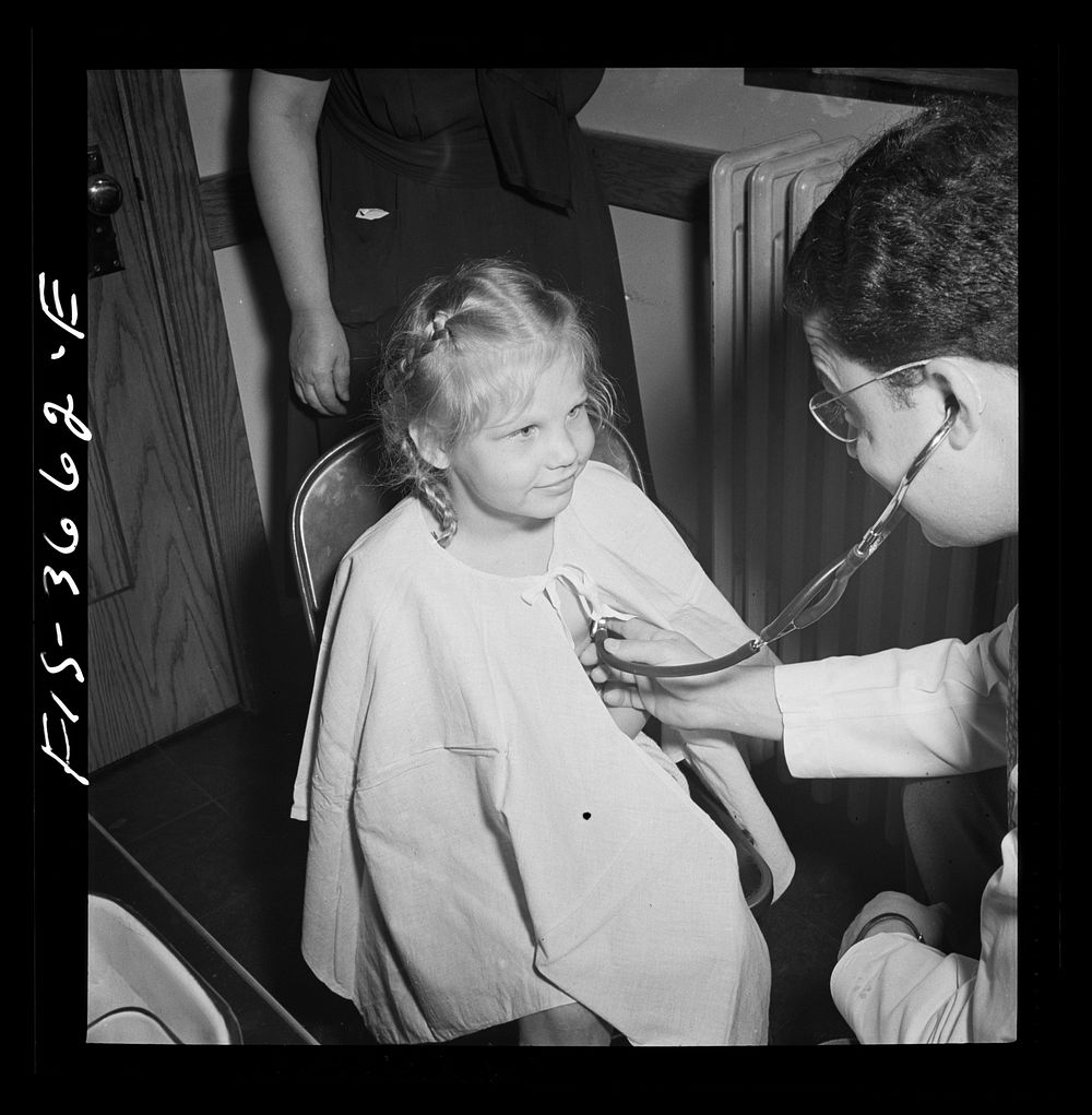 Greenbelt, Maryland. Each child is entitled to a free physical checkup once a year. Sourced from the Library of Congress.